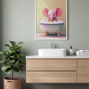 Affiche éléphant rose encadrée posée sur une étagère décorative